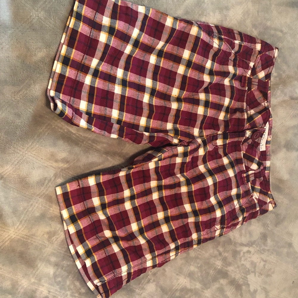 Plaid shorts.